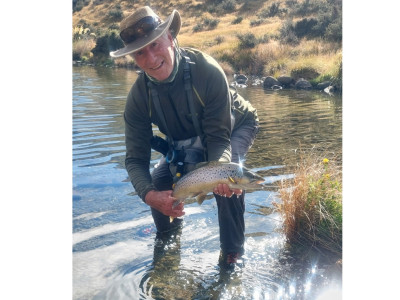 CSIRLFEB2026  South Canterbury's Anglers Club member Grant Weston with a top conditioned brown from Lake Heron