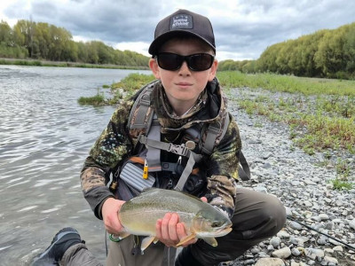 A happy Junior with a nice Rainbow.