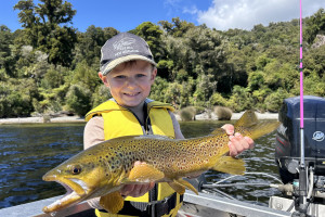 Harrison finding success on Lake Brunner with a woolly bugger in choppy conditions.