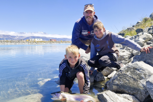Osten Kenyon with brother Rylan and Dad Rob from Palmerston North tasted success at the hydro canals while on their family holiday.