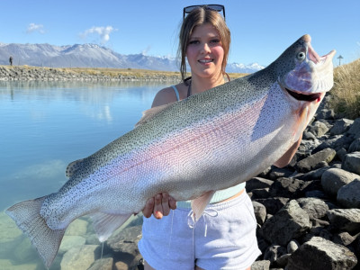 WFR2526.170 Ava Stapelfeld with her 19.5 lb rainbow trout caught in the Tekapo Canal.