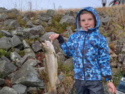 WFR2526.205 Thomas Jackson, age 8, with his first ever trout.