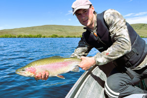 WFR2425 39 Fish Game Ecologist Blake Harper with a feisty 4.5 lb rainbow trout caught and released at Lake Alexandrina