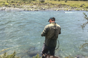 Fishing the edge which is the only clear quiet bit of water 1