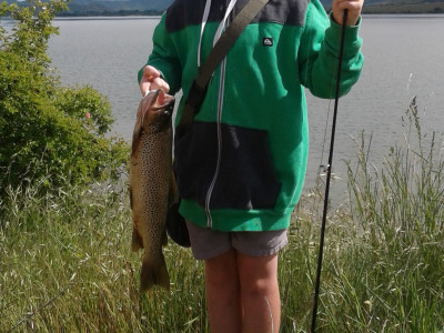 RLnovCSI1 Jack Gillespie 9 with his brown trout caught on his grandads fly rod at Lake Benmore credit A Gillespie